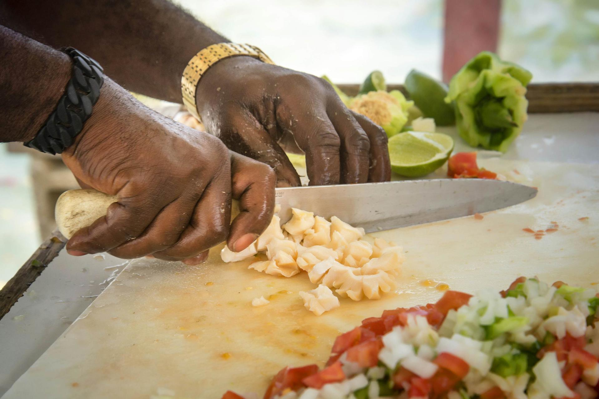 Making conch salad on the street
