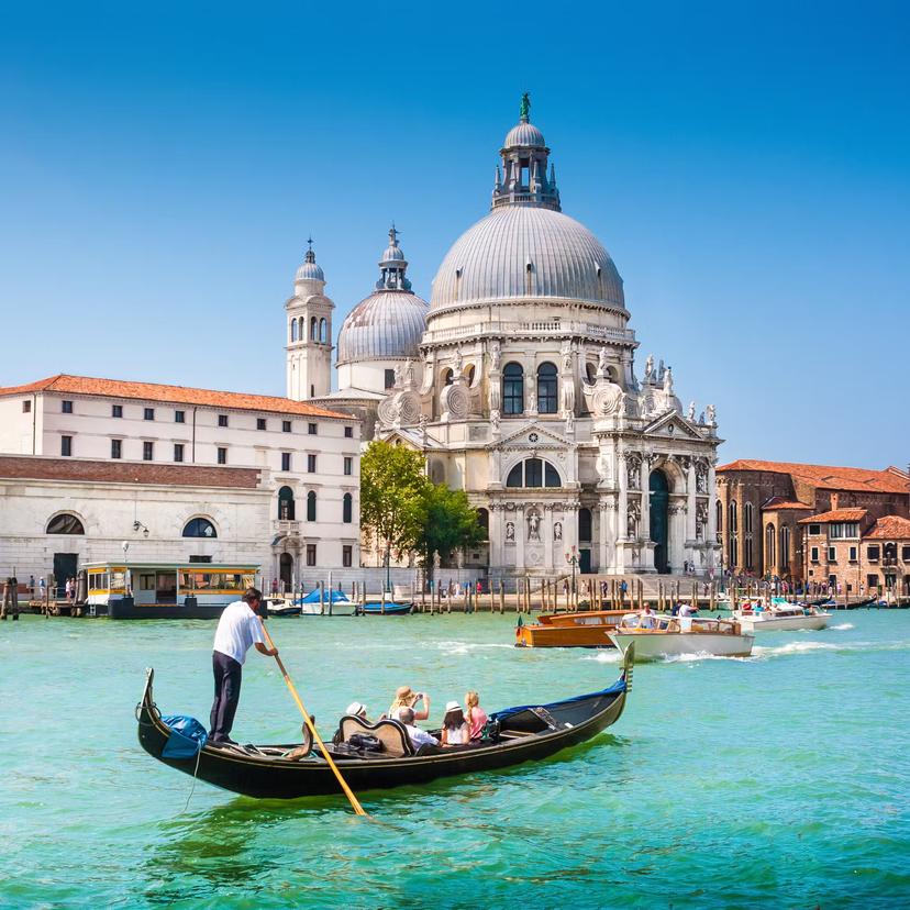 Traditional Gondola on Canal Grande with Basilica di Santa Maria della Salute in the background, Venice, Italy
