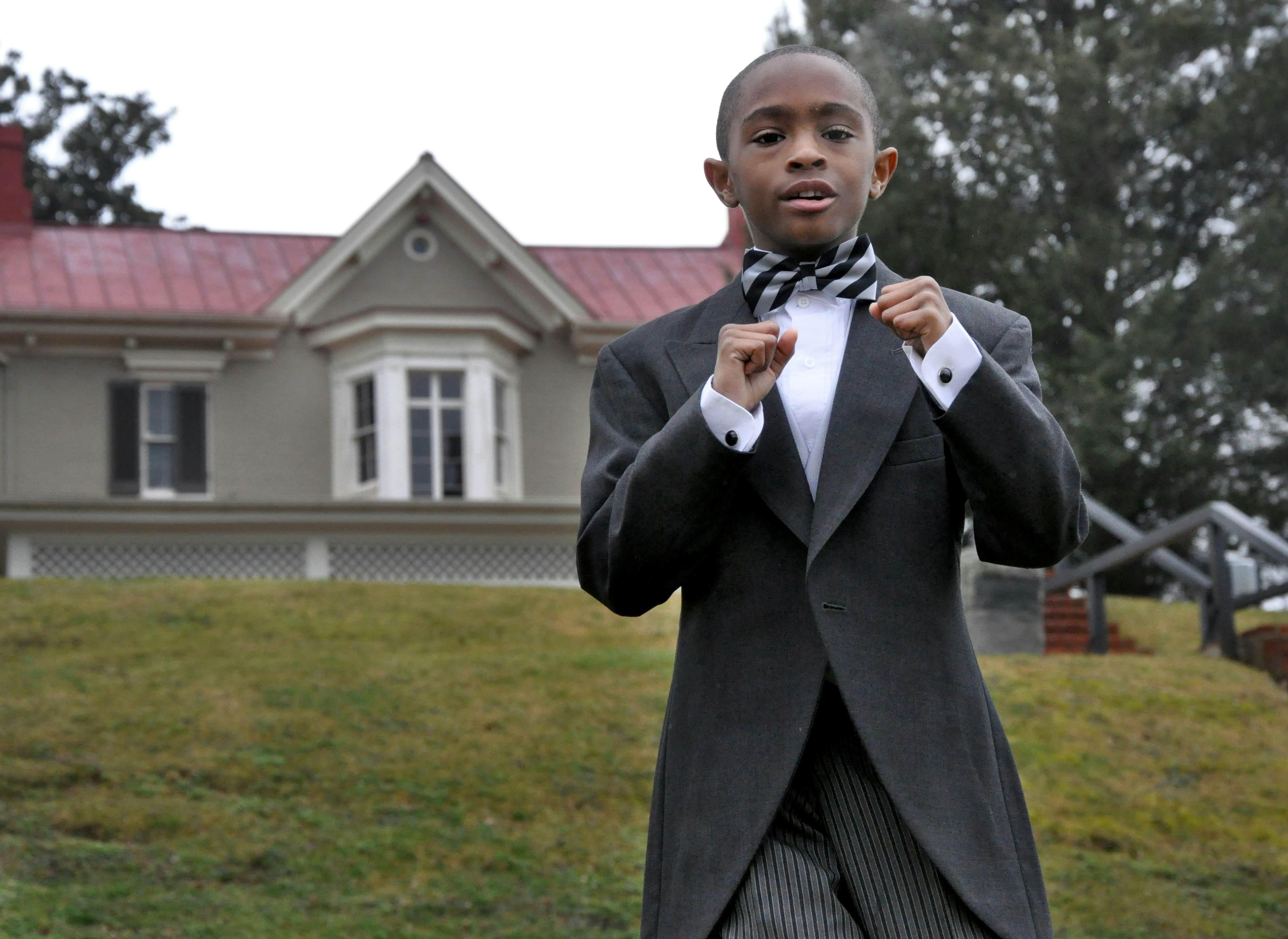 WASHINGTON, DC - FEBRUARY 11:  Brayden Wood, 8,  of Upper Marlboro, Md., one of the winners of the Frederick Douglass National Historical Site's oratorical competition, poses for a photograph in front of the historic Douglass home in southeast Washington, DC on February 11, 2012. He performed an excerpt from Douglass' famous speech, "Fighting Rebels With Only One Hand," 1861.  (Photo by Sonya Doctorian/The Washington Post via Getty Images)
