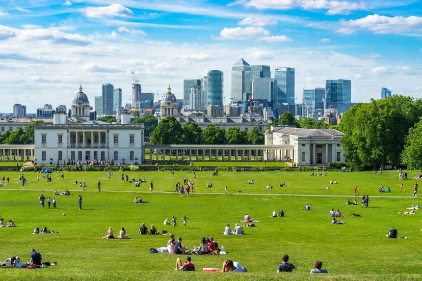 18 April 2017: People on the grass at Greenwich park on a sunny spring day. Greenwich Park is a former hunting park in Greenwich and one of the largest single green spaces in south-east London.