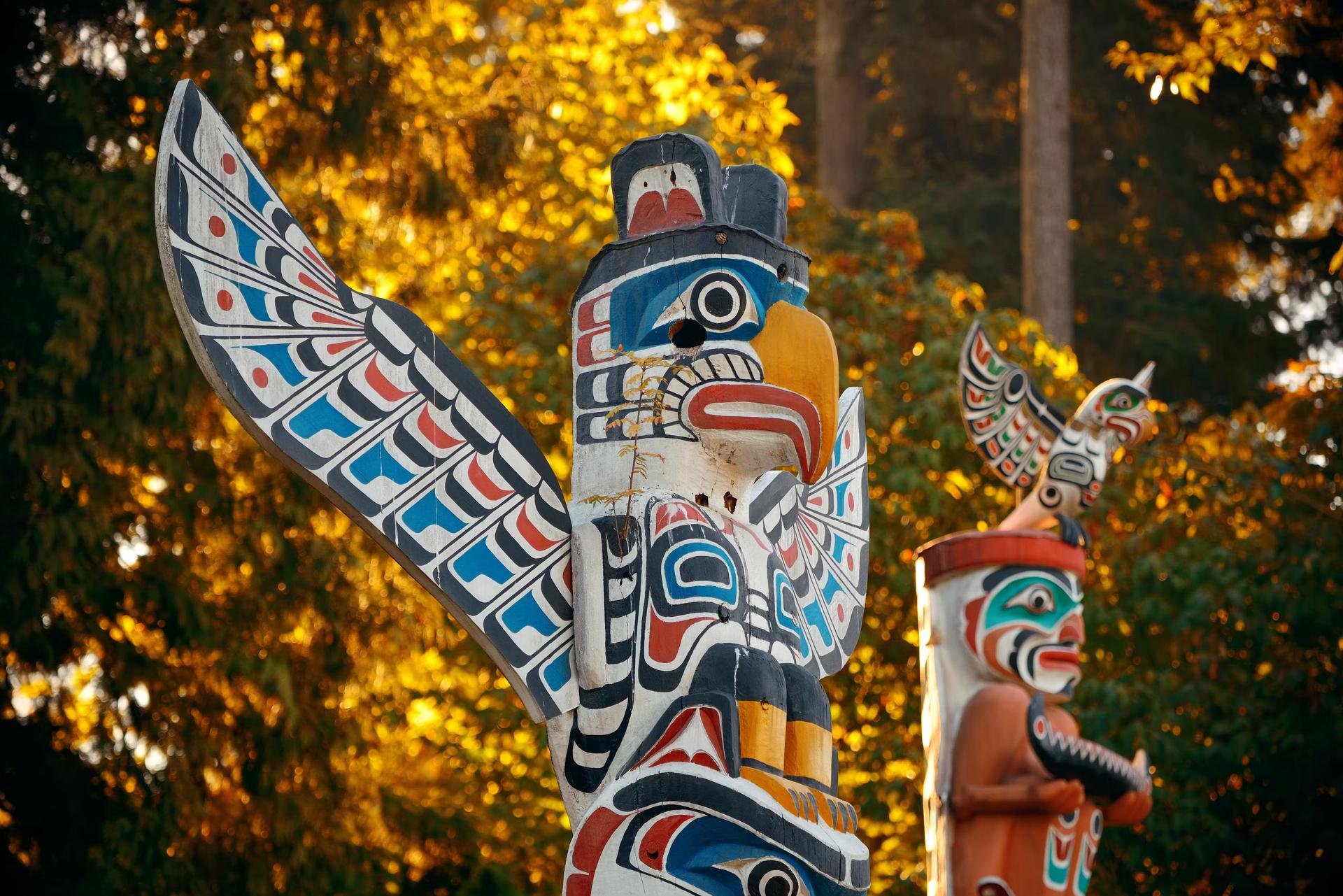 First Nations totem poles in Stanley park in Vancouver, Canada. 