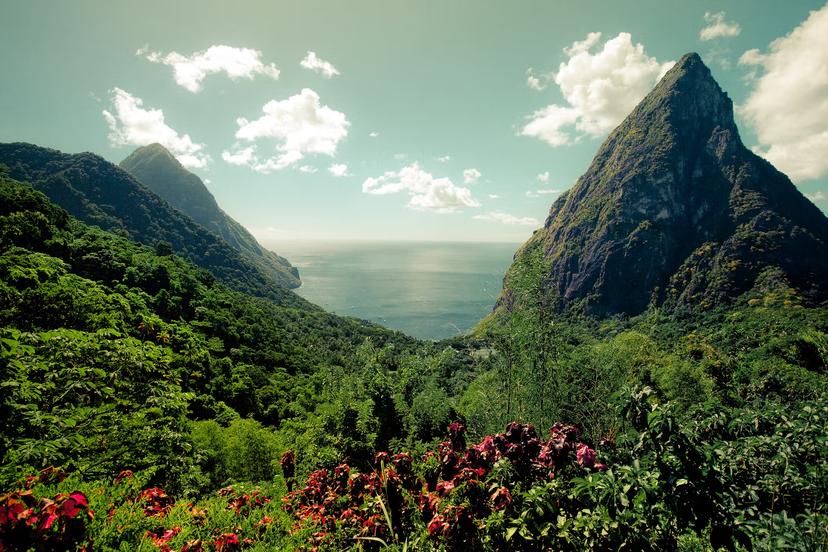 Beautiful rain forest surrounding the lake and the mountain peeks in this Caribbean paradise
