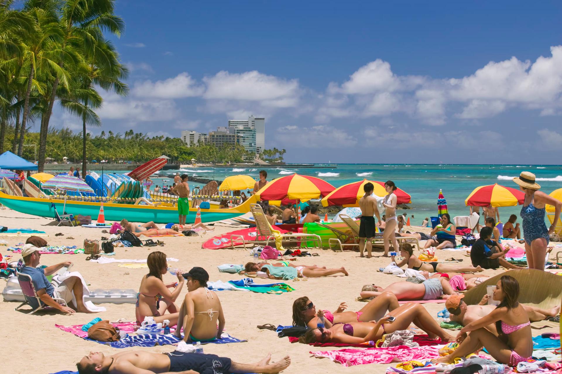 Tourists Sunbathing on Waikiki Beach