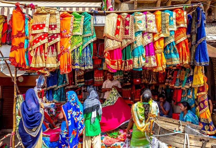 Crowded shopping street in Delhi, India
