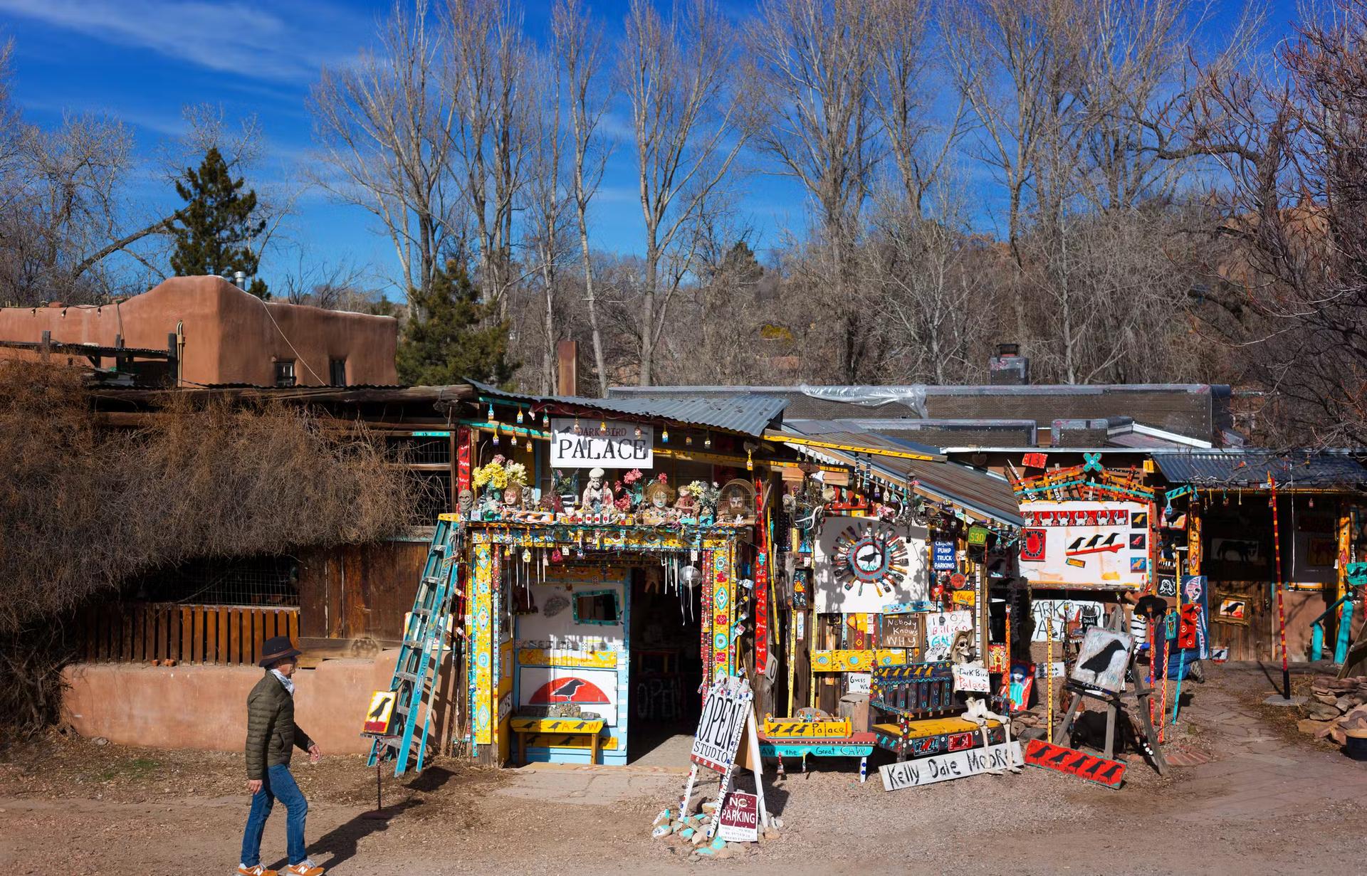 Man Walking Past Art Gallery on Canyon Road in Santa Fe, New Mexico