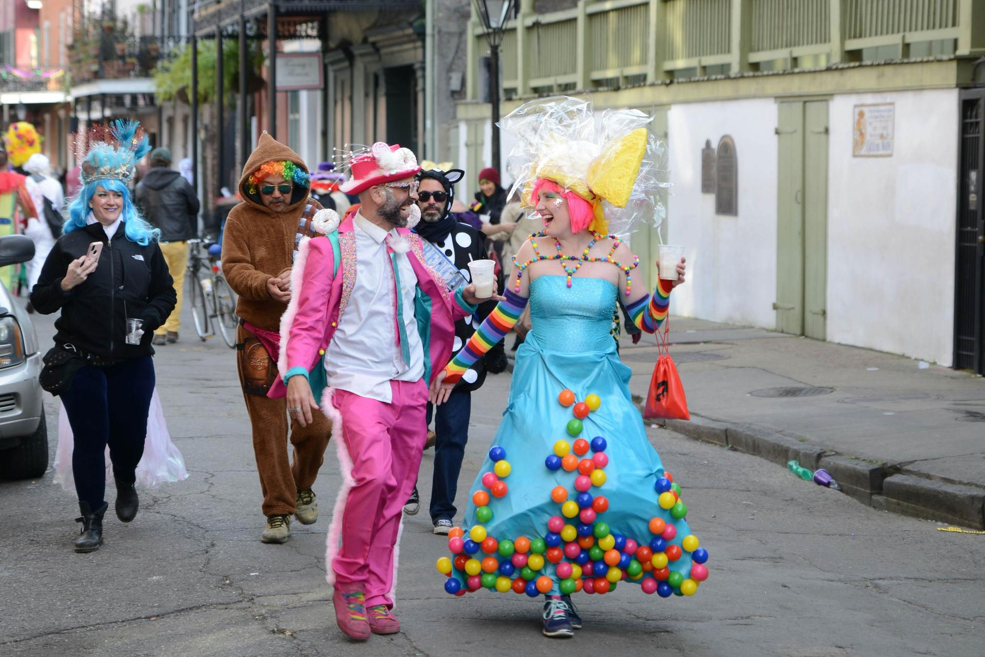  People in costume celebrate Mardi Gras on the streets of New Orleans. 