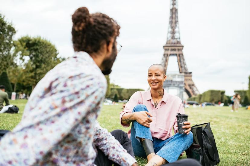 Image of multiracial people in Paris near Eiffel tower
