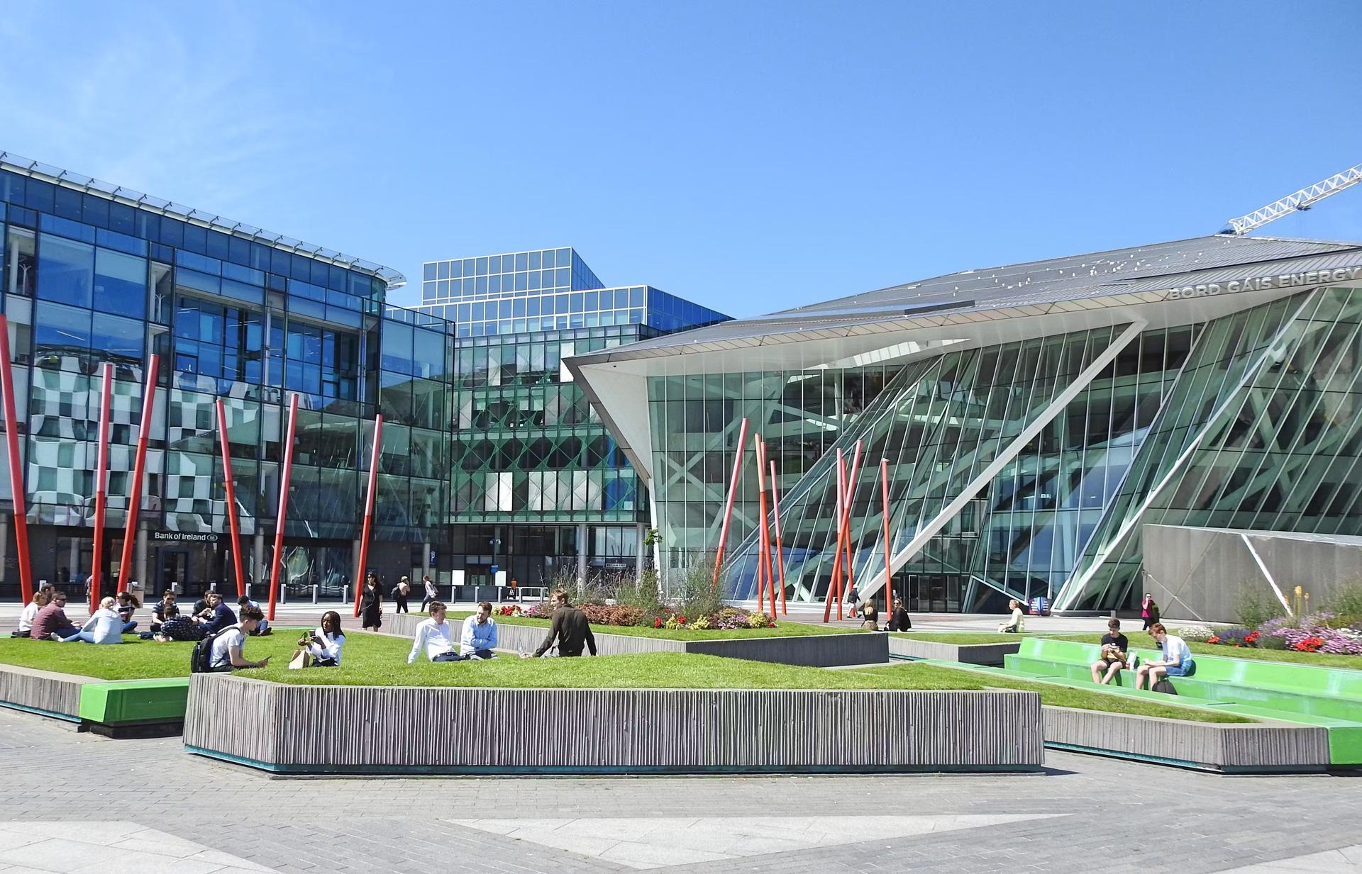 People relaxing outdoors in front of the Bord Gais Energy Theatre