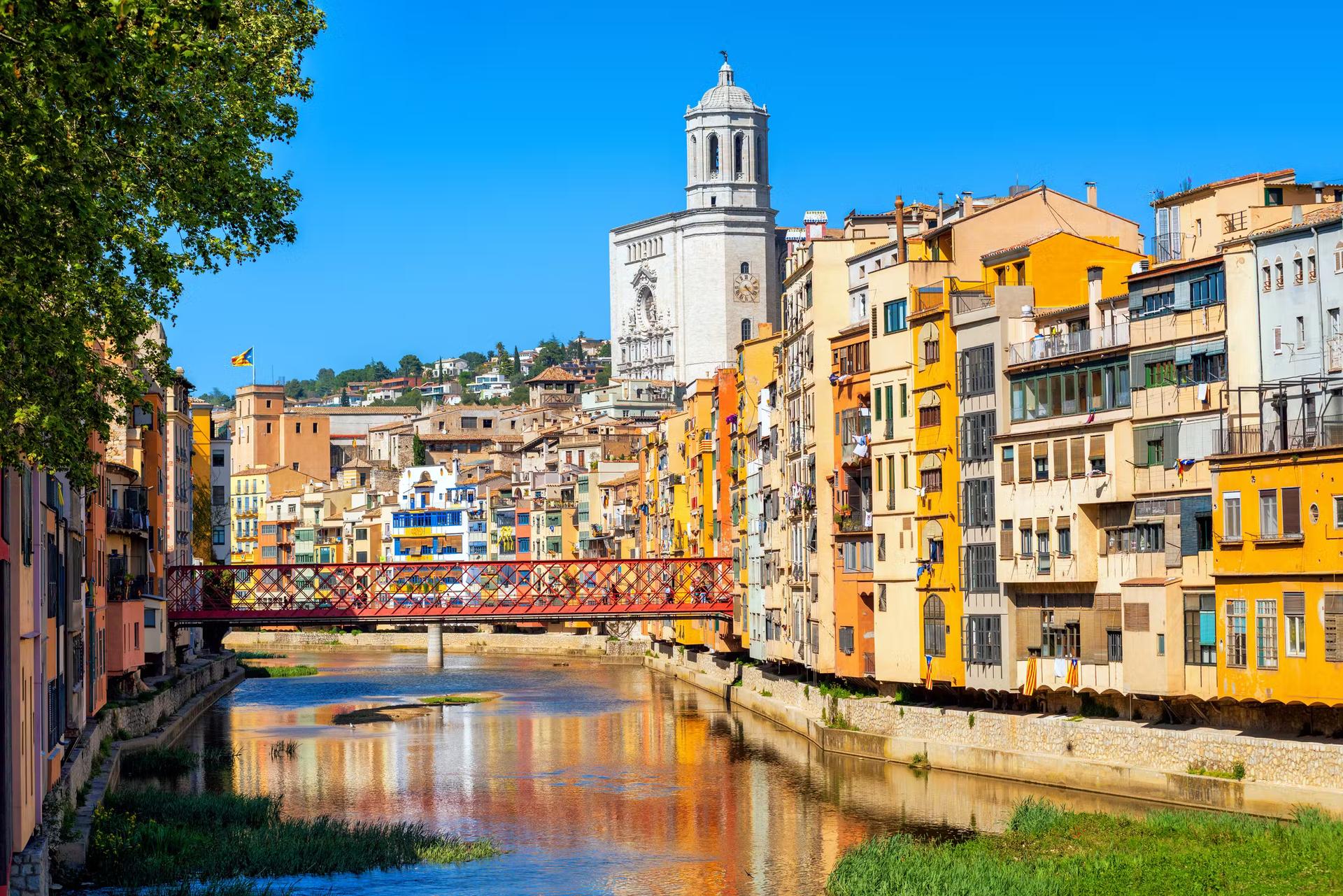 Traditional colorful houses and gothic Cathedral in Girona Old Town
