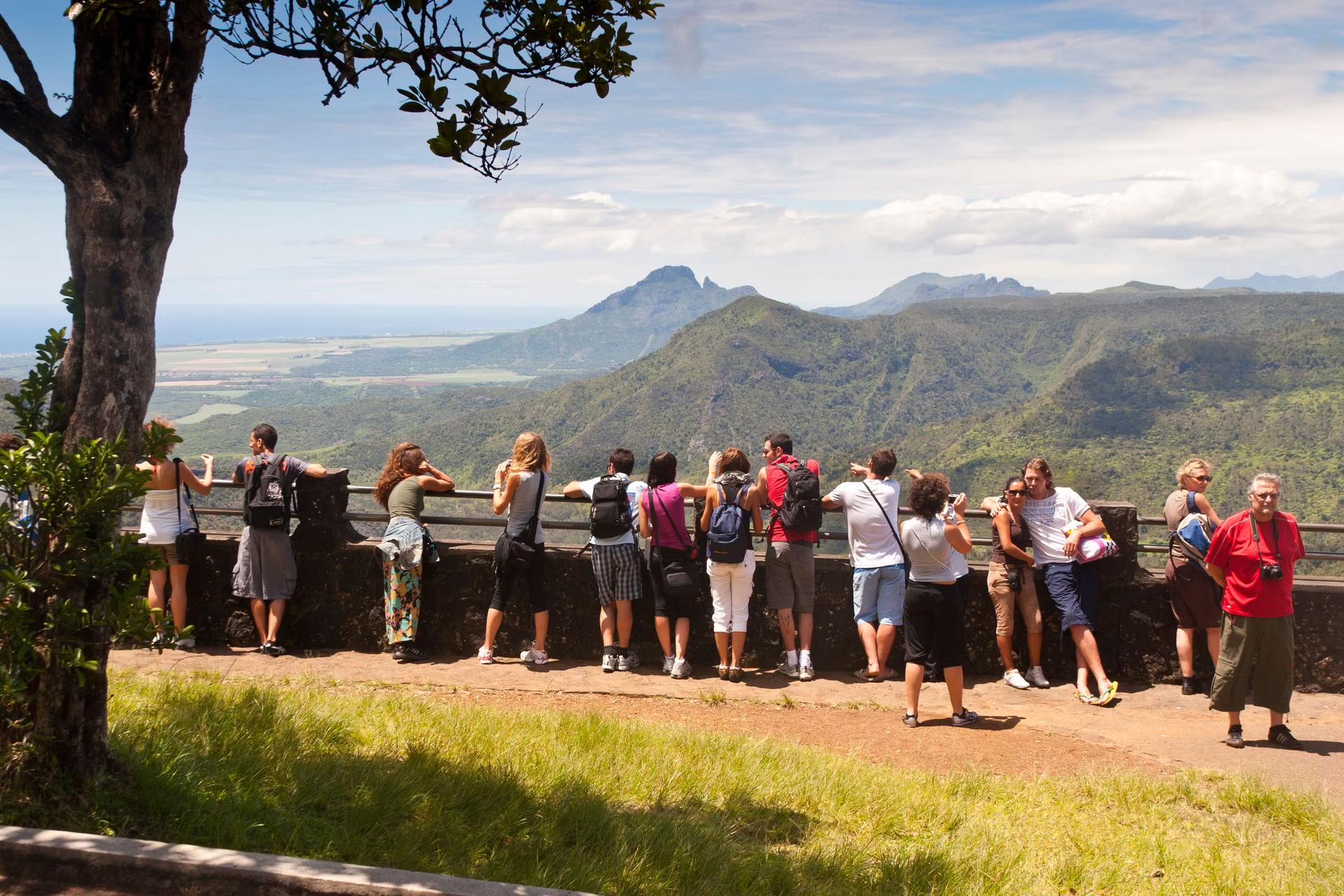 People looking out and taking pictures at a viewpoint in Black River Gorges National Park, Mauritius