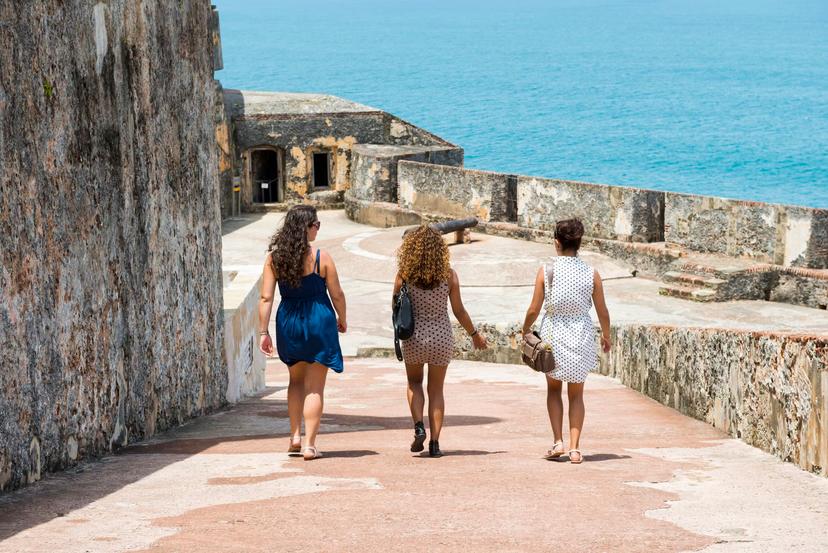 Three young women visit Castillo San Felipe del Morro, a 16th-century Spanish fort in San Juan, Puerto Rico
174938254
"Travel, People Traveling, Tourism, Only Women, Women, Female, Small Group Of People, Group Of People, Young Adult, Adult, Walking, Latin American and Hispanic Ethnicity, History, Famous Place, Tropical Climate, Travel Destinations, Vacations, Lifestyles, Rear View, Tourist, People, Morro Castle, Old San Juan, San Juan - Puerto Rico, Puerto Rico, Summer, Sea, Fort, Purse, Dress, Lifestyle, Travel Locations, People, Young Adults, Castillo San Felipe Del Morro, United States National Park Service"