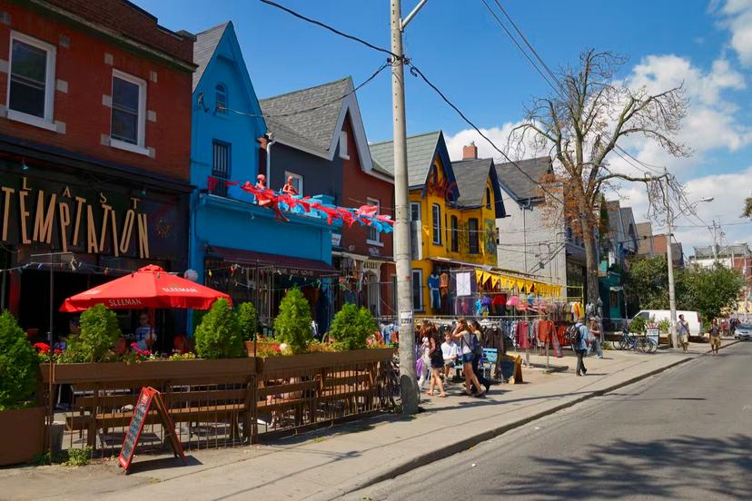 Colorful shops and buildings on Kensington Avenue Market in Toronto