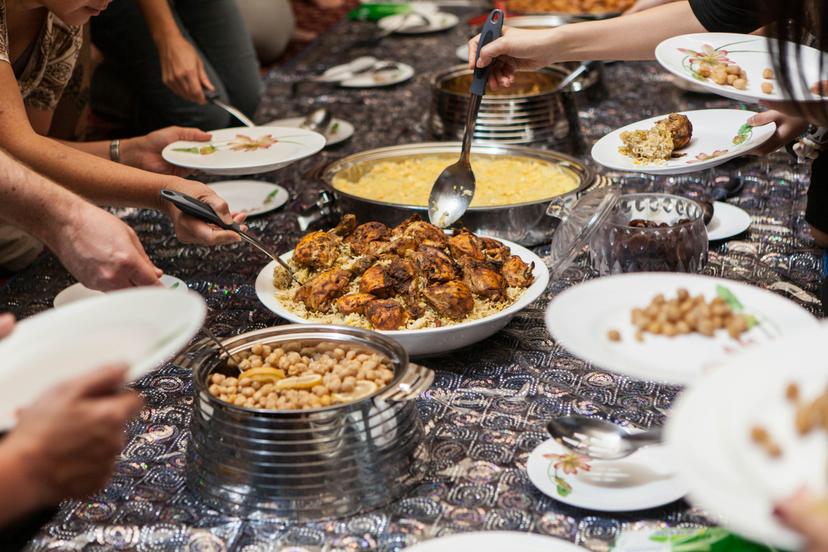 Food is served on the floor in the middle of the majlis at the Sheikh Mohammed Centre for Cultural Understanding in Al Fahidi district, Dubai, UAE