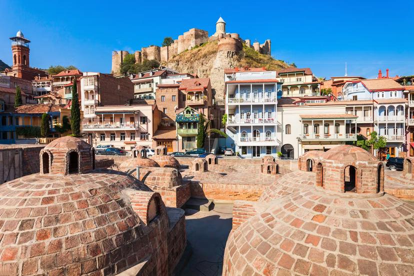 Tbilisi's Old Town is famous for its domed abanotubani (sulphur baths) and colourful houses with wooden balconies © saiko3p / Getty Images