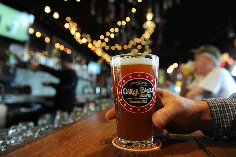 Oskar Blues' most popular beer is the Dale's Pale Ale seen in a glass on the counter of Oskar Blues restaurant in Longmont. 