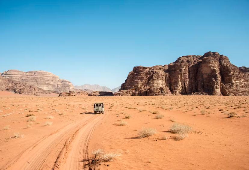 Pick-up truck in the desert in Wadi Rum, Jordan