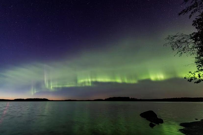 The auroral dunes appear as a green-tinged and even pattern of waves © Kari Saari