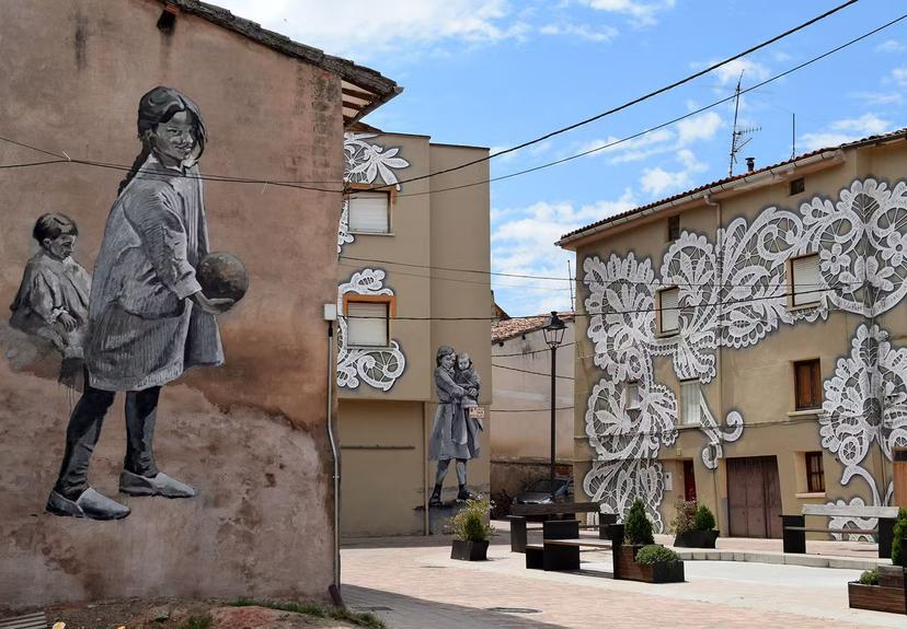 Street artists cover Spanish village in murals celebrating local women 