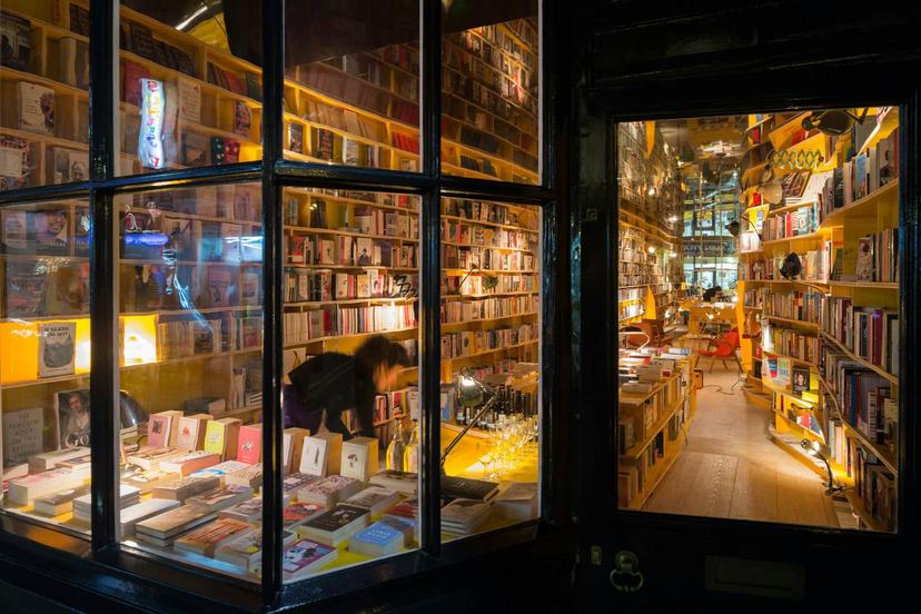 The lights of Libreria Bookshop will make you want to step inside and browse for hours © Iwan Baan / Libreria
