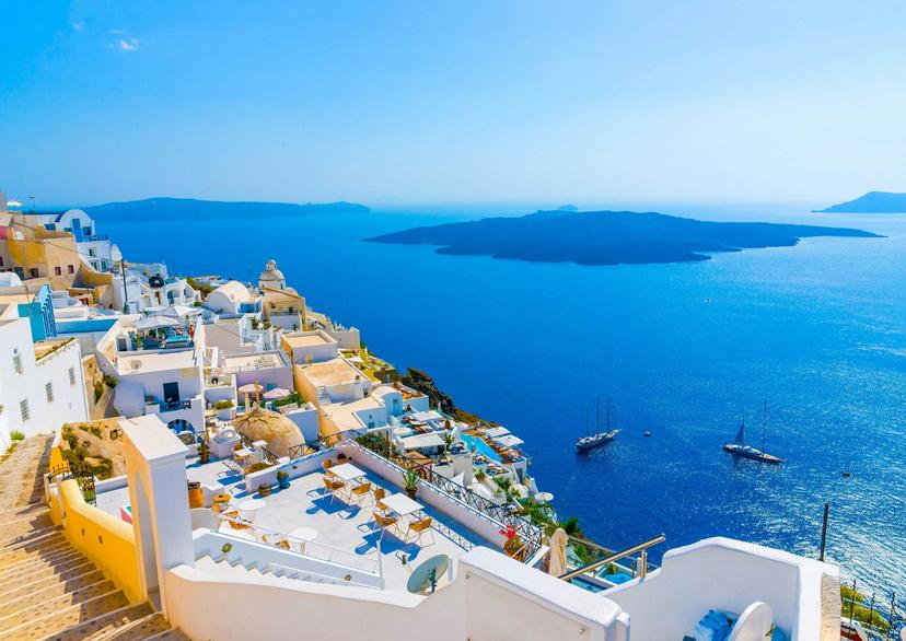 View to the sea and volcano from Fira, the capital of Santorini island in Greece