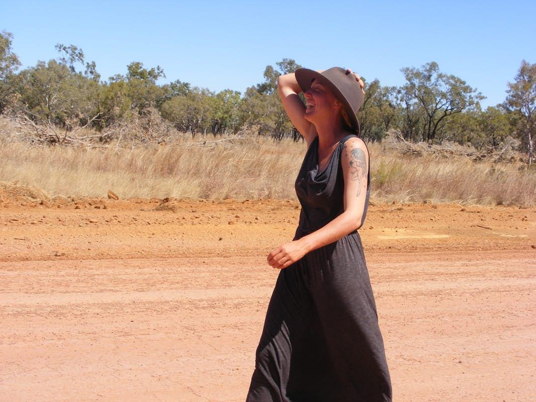 Angela walking on the road in Australia. 